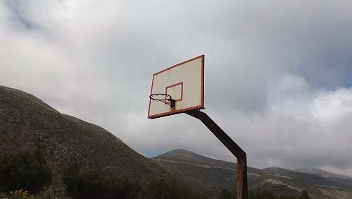 grey white and orange basketball hoop close-up photography vathia