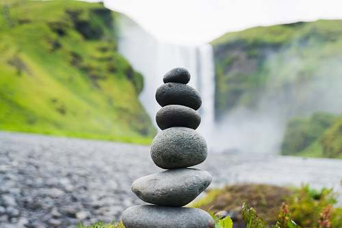 iceland cairn stone in Skogafoss Falls, Iceland rock