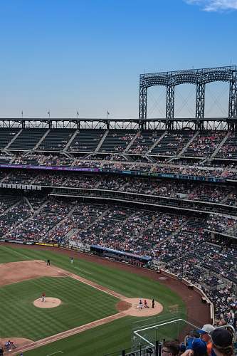 human view of baseball field under clear sky building