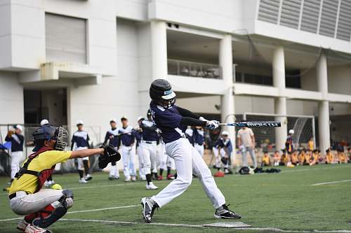 human baseball players playing baseball on baseball field people