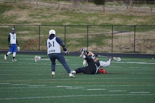human four men playing on the field apparel