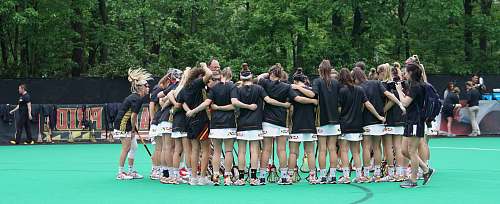 team group of women doing group hug sport