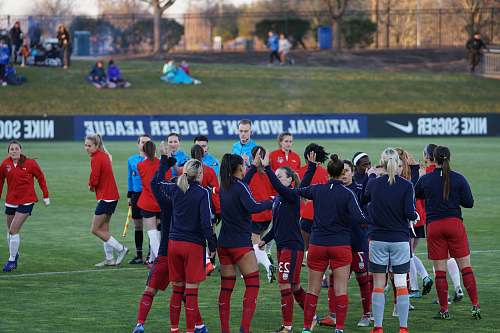 human group of women football player on field people