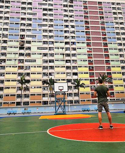 human man in basketball court building