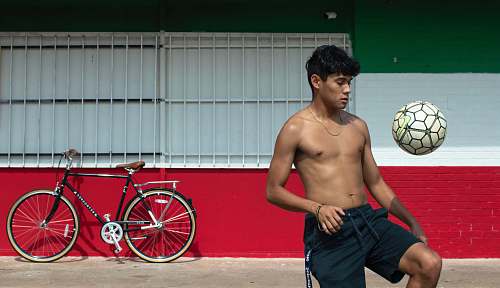 bike man using volleyball bicycle