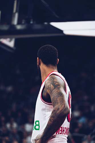 human man wearing basketball jersey shirt athlete