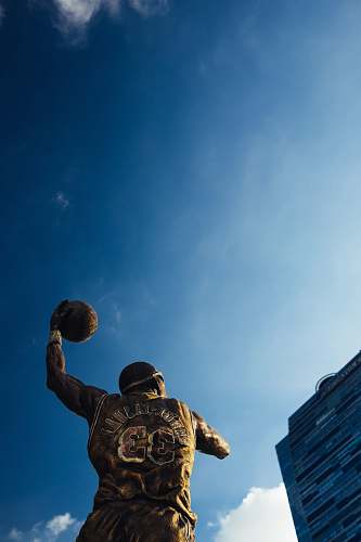 human NBA player statue blue