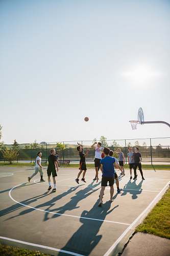human people playing basketball people