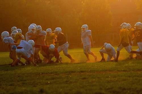 human people playing football people