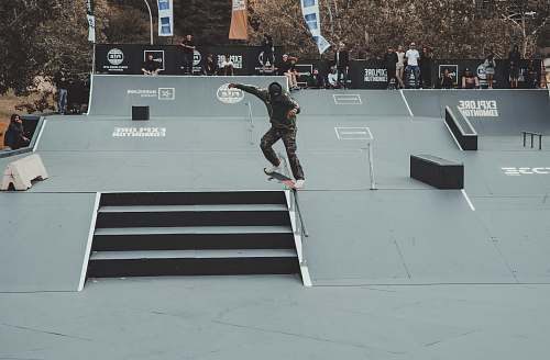 skateboard person skidding skateboard on rail sports