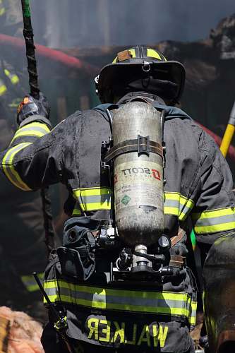 human shallow focus photo of firefighter fireman