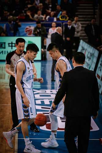 sport two basketball players facing each other on court basketball