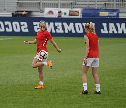 human two women playing soccer people