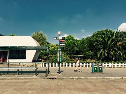 basketball white camper trailer in front of waiting shed basketball court