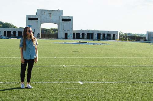 human woman standing on field field