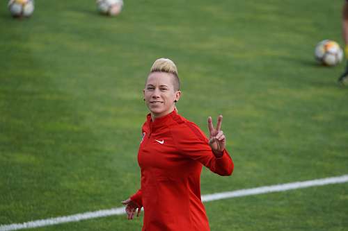 human woman wearing red Nike shirt ball
