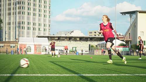 people women playing soccer human