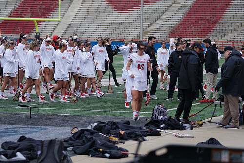 human women wearing white walking on grass apparel