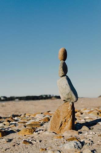 ground shallow focus photo gray balance stone barnstable county