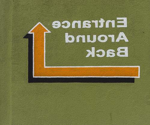 field entrance around back signage building