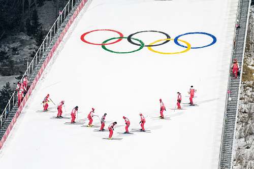 snow people skiing during Winter Olympics white