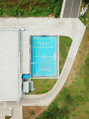 sports aerial photography of building near basketball court door