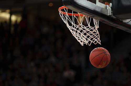 team ball under basketball ring basketball