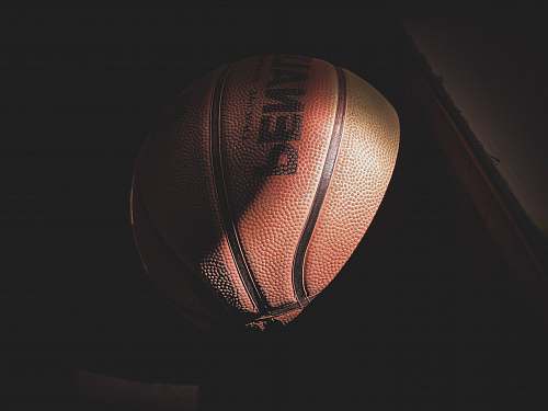 sports basketball near brown table basketball