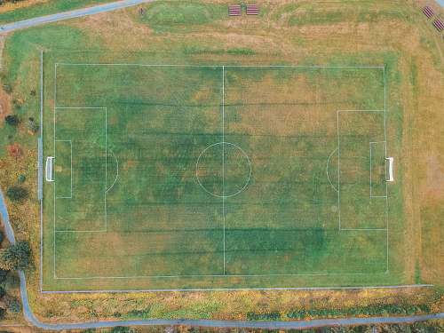 field green and brown soccer field sports