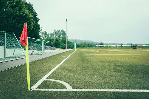 field minimalist photo of soccer field football