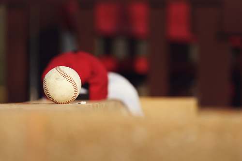 apparel shallow focus photo of white baseball clothing