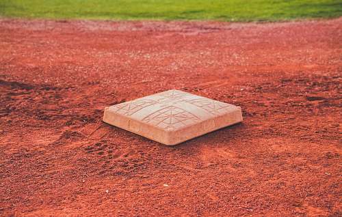 sports square brown concrete baseball base on soil baseball