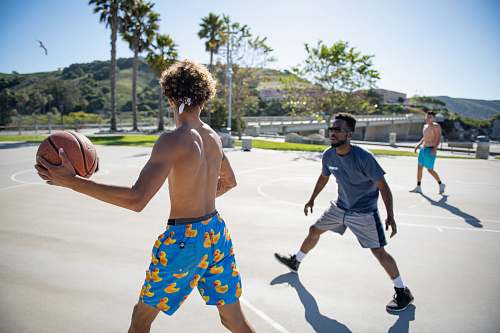 basketball three men playing basketball person