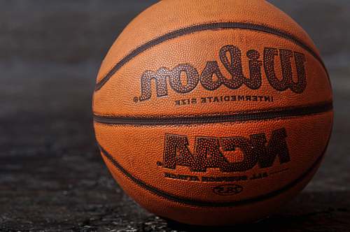 sports Wilson NCAA basketball on black board basketball