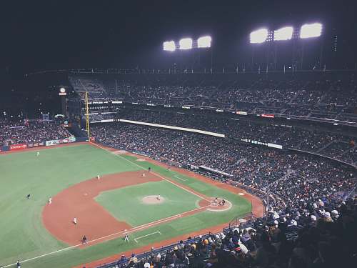 stadium baseball field during night time crowd