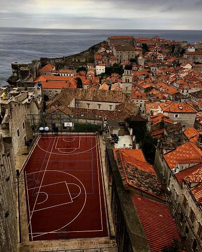 basketball aerial photography of basketball court near town team sport