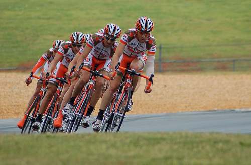 sport four cyclist on road bicycle