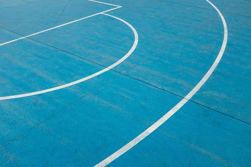 sport white painted lines on blue court floor team sport