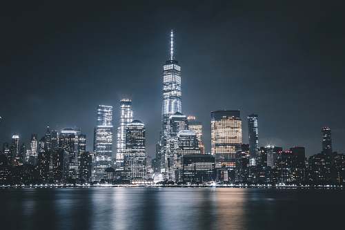 building landscape photography of high-rise building during nighttime city