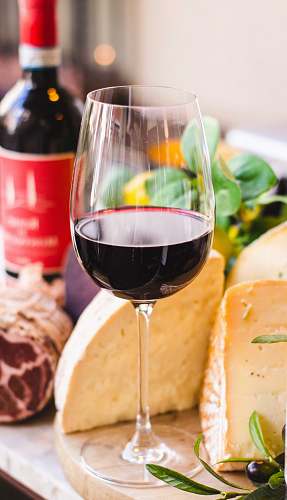 drink long-stem wine glass filled with red wine alcohol