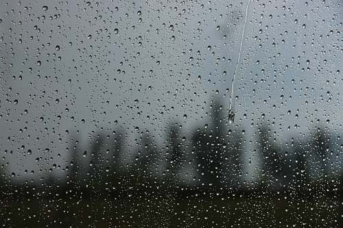 flock droplets on glass pane grey