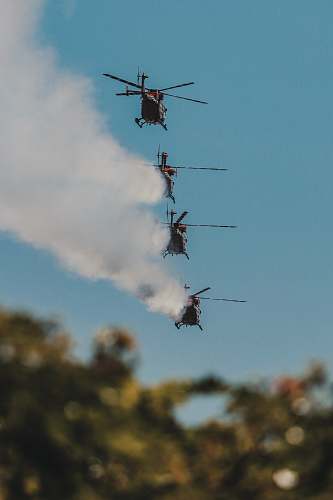 vehicle four black helicopters transportation