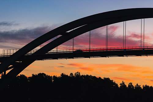 bridge silhouette of suspension bridge during sunset arch bridge
