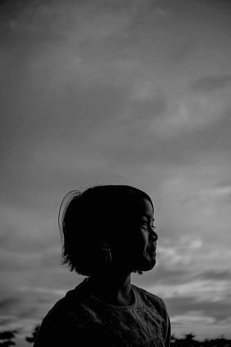 silhouette greyscale photography of girl person