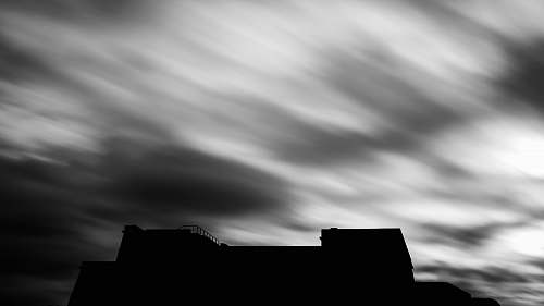 nature low angle photography of building weather