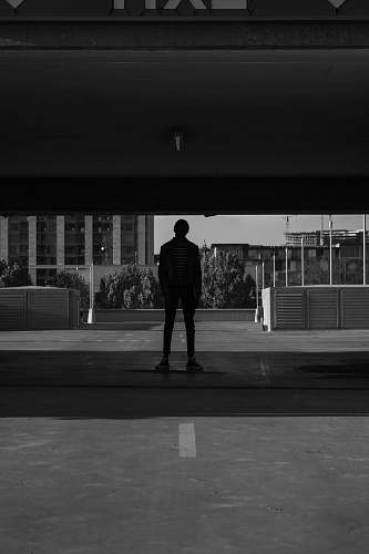 human man standing under the bridge person