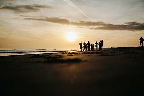 beach silhouette of people at seashore people