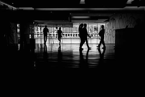 person gray-scale photo of people walking black-and-white