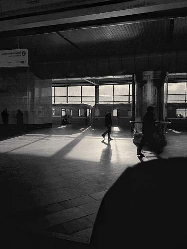 person people walking inside building floor