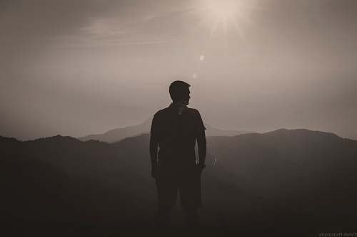 person silhouette of man looking towards left people